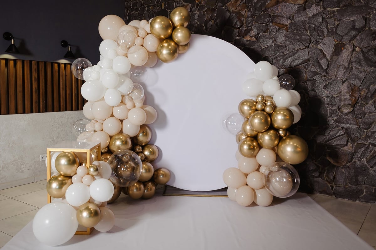 Balloon garland arch decoration framing a party backdrop